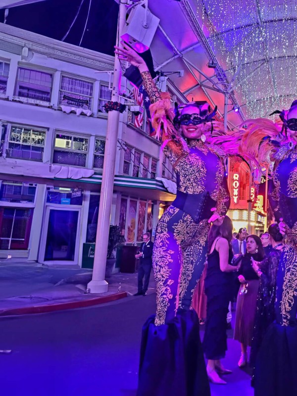 Dancers with masks Event Revolution Auckland Event company